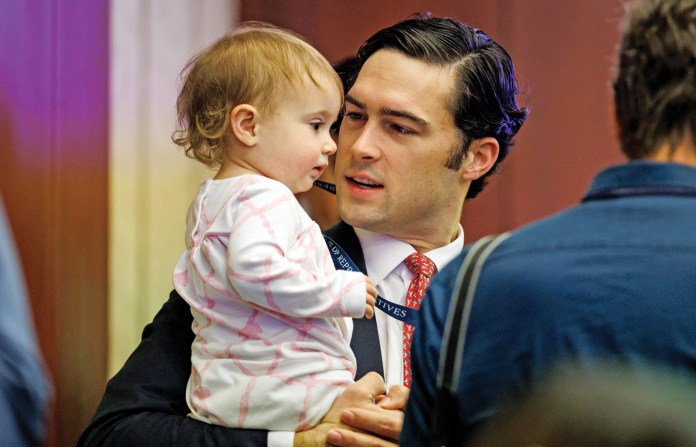 Gill with his 16-month-old daughter, Marigold, during orientation for new congressional members, Nov. 12, 2024. (Sameul Corum/AFP/Getty)