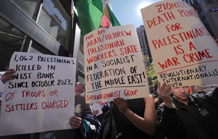Pro-Palestinian demonstrators rally outside the Israeli Consulate in Midtown Manhattan and march through the streets of New York to make their voices heard, calling for the release of Palestinian prisoners and an end to their detention, in New York City, United States, on April 07, 2026. (Photo by Selcuk Acar /Anadolu via Getty Images)