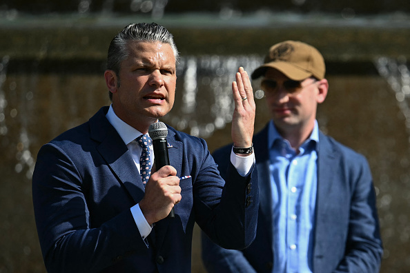US Secretary of Defense Pete Hegseth (L) speaks alongside White House Deputy Chief of Staff Stephen Miller (R) during a "DC Safe and Beautiful Task Force" ceremony with the National Guard at Meridian Hill Park in Washington, DC, on July 2, 2026.