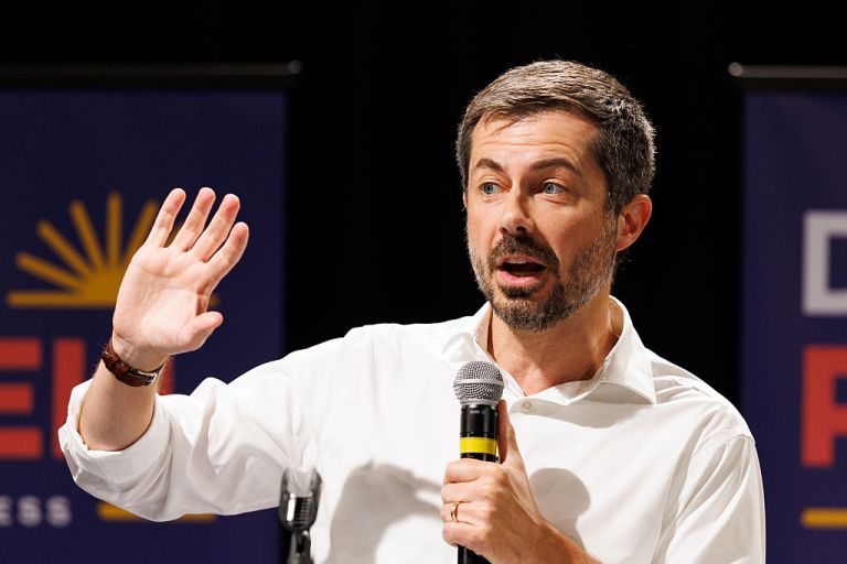 Former U.S. Transportation Secretary Pete Buttigieg speaks during a campaign event for Denise Powell.