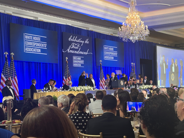 President Donald Trump shakes hands with Wall Street Journal reporters awarded the Katharine Graham Award for Courage and Accountability for their reporting on Trump's past relationship with Jeffrey Epstein. Photo by James Downs.