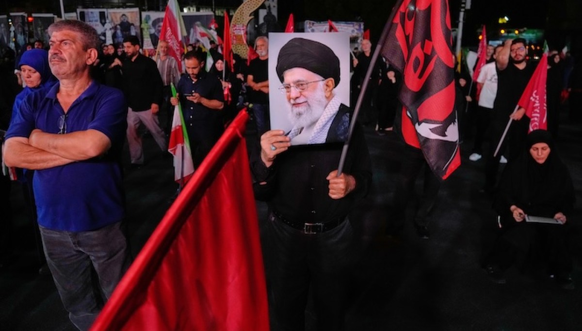 Iran's useful American idiots chant 'down with USA' while Tehran plots to kill Trump