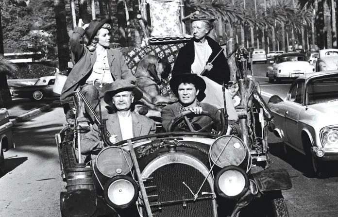Donna Douglas, Irene Ryan, Buddy Ebsen, and Max Baer Jr. in an episode of The Beverly Hillbillies. (CBS/Courtesy of Getty Images)