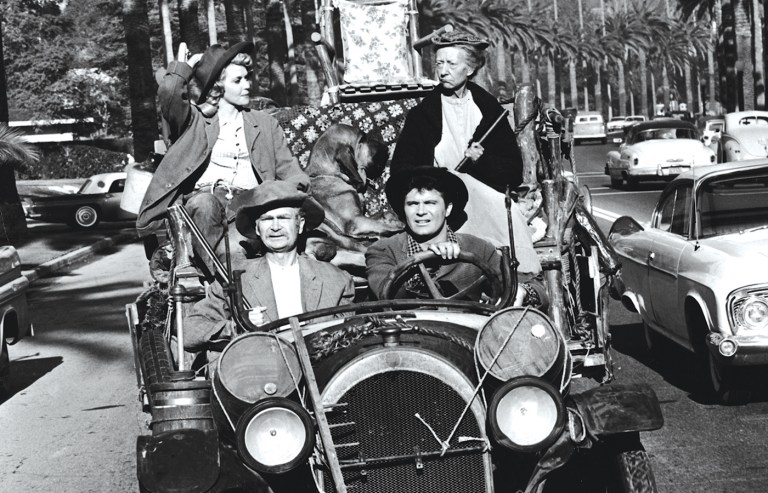Donna Douglas, Irene Ryan, Buddy Ebsen, and Max Baer Jr. in an episode of The Beverly Hillbillies. (CBS/Courtesy of Getty Images)