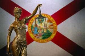 Florida took on the billboard lawyers. Now, policyholders are getting $760 checks