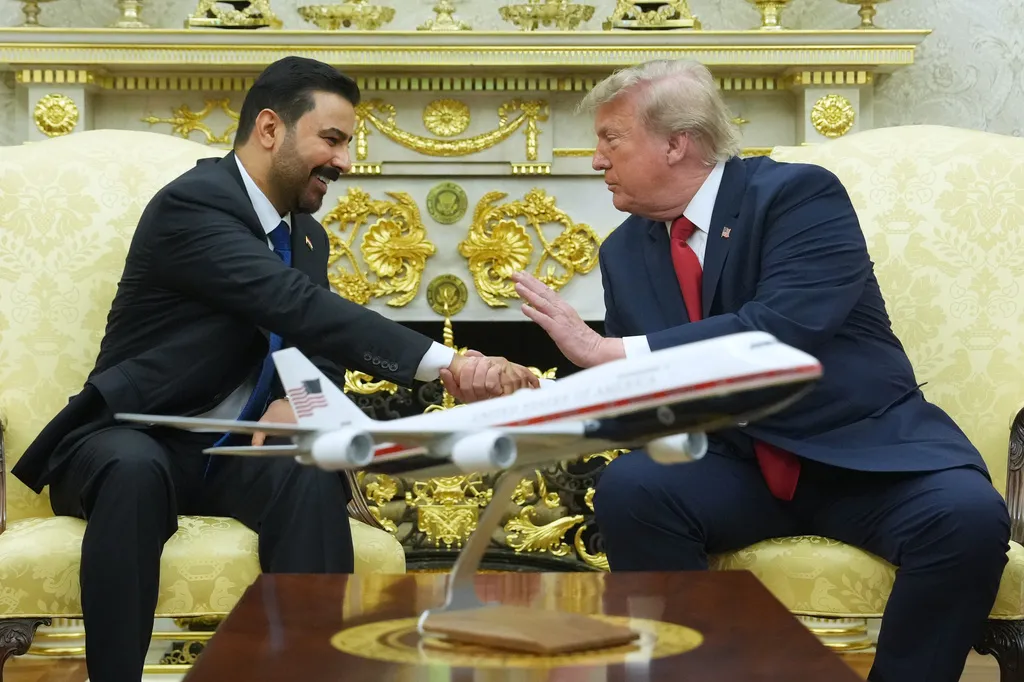 President Donald Trump meets with Iraq's Prime Minister Ali al-Zaidi in the Oval Office of the White House, Tuesday, July 14, 2026, in Washington. (AP Photo/Julia Demaree Nikhinson)