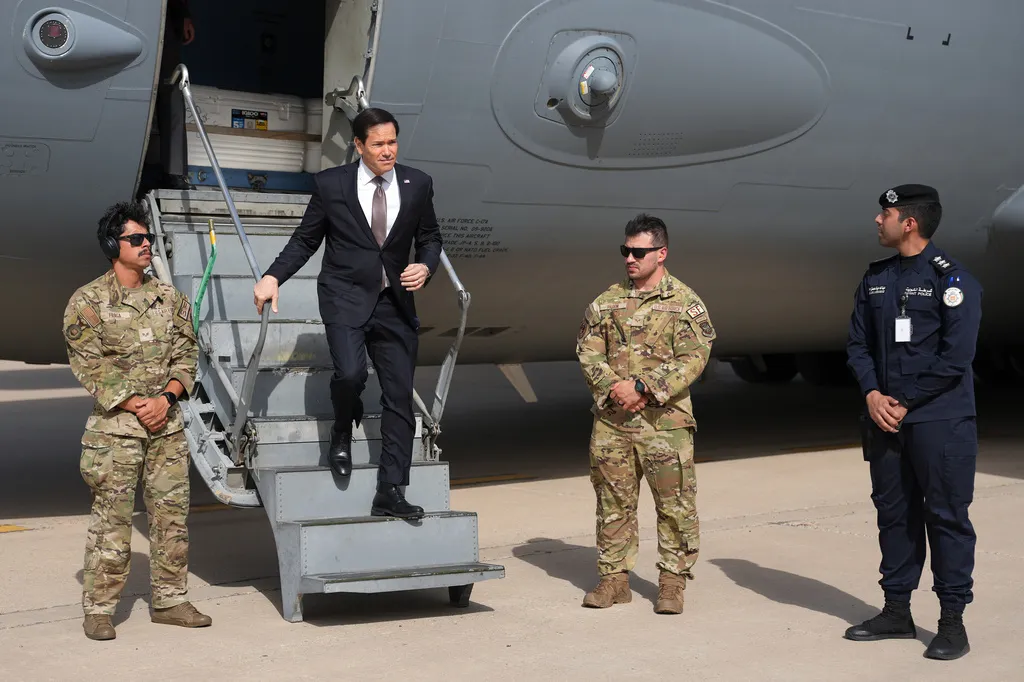 U.S. Secretary of State Marco Rubio disembarks a U.S. Air Force C-17 Globemaster III transport aircraft at Kuwait International Airport during his visit to the Middle East to discuss the interim deal between the U.S. and Iran with Arab Gulf allies, in Kuwait City, Kuwait, Wednesday, June 24, 2026. (Eric Lee/Pool photo via AP)