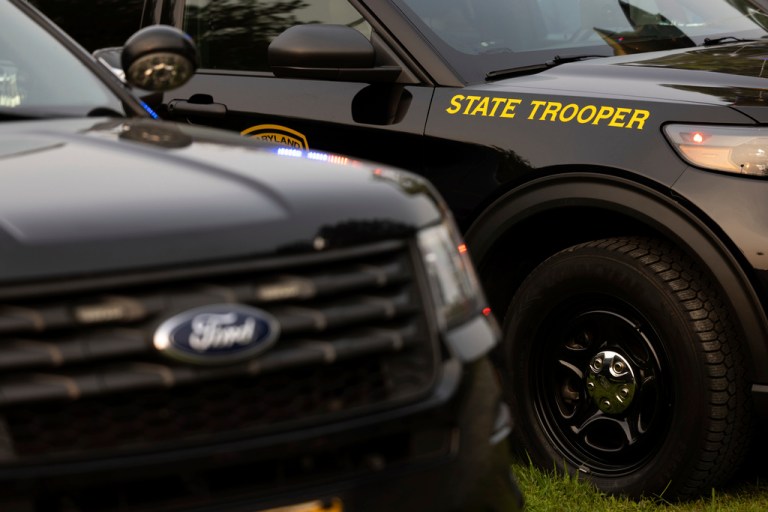 Two Maryland State Trooper cars sit side by side.