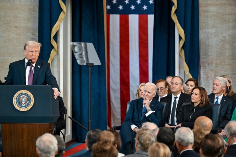 President Donald Trump gives a speech with Bill Clinton in the audience.