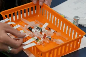 Mother urges Supreme Court to let her kindergartener remain enrolled during religious vaccination fight