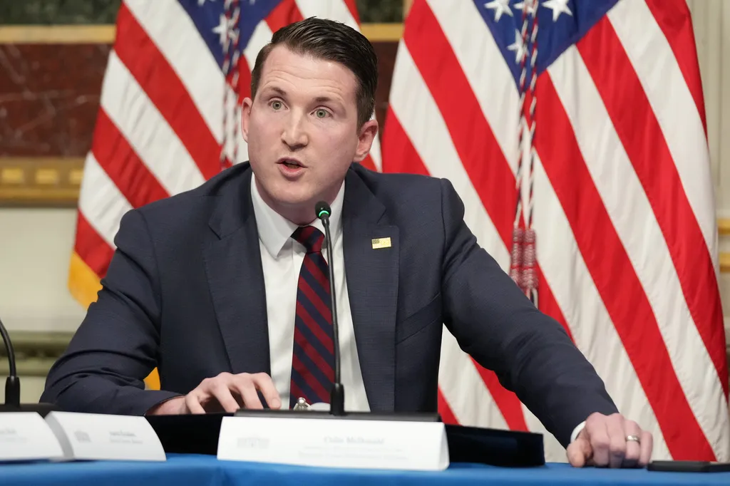 Assistant Attorney General Colin McDonald speaks in the Eisenhower Executive Office Building at the White House complex, Tuesday, May 26, 2026, in Washington. (AP Photo/Mark Schiefelbein)
