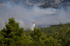 Two firefighting helicopters collide midair near Athens as Europe’s wildfire emergency rages