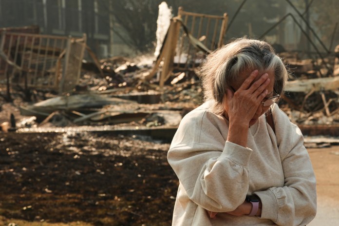 Washington state fires destroy hundreds of buildings and force Spokane-area residents to evacuate