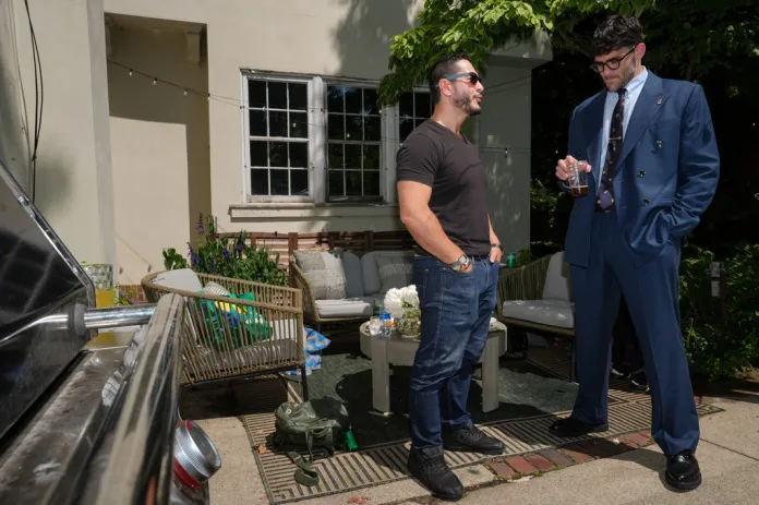 Abdul El-Sayed, a progressive candidate in the Democratic primary for U.S. Senate in Michigan, talks poolside with streamer Hasan Piker at a party for content creators supporting his campaign, Monday, Aug. 3, 2026, in Detroit. 