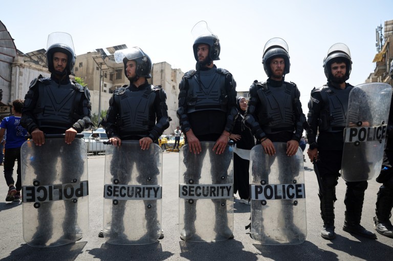 Riot police in Syria