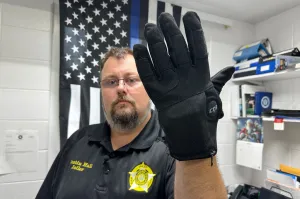 The ICE shock glove is not the story. Who’s wearing it is