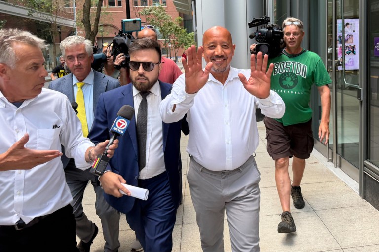Lawrence, Mass., Mayor Brian DePena waves as he leaves federal court