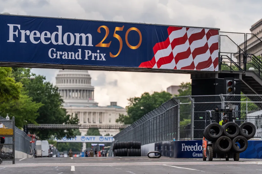 The U.S. Capitol is seen beyond the Freedom 250 Grand Prix race track, Tuesday, Aug. 18, 2026, in Washington. (AP Photo/Julia Demaree Nikhinson)