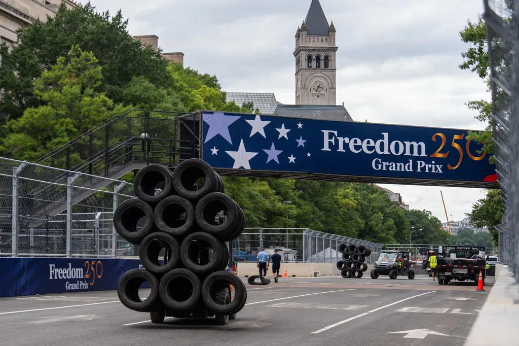 Tires are moved around the Freedom 250 Grand Prix race track, Tuesday, Aug. 18, 2026, in Washington. (AP Photo/Julia Demaree Nikhinson)