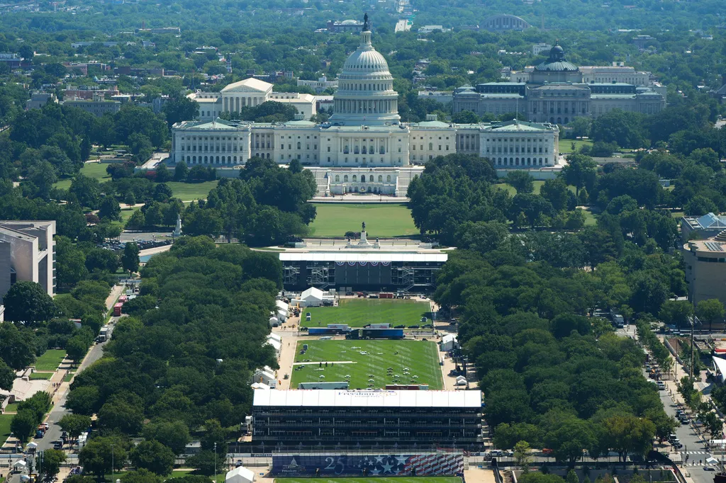 The U.S. Capitol is seen as construction continues on the National Mall ahead of the Freedom 250 Grand Prix, Wednesday, Aug. 19, 2026, seen from the Washington Monument in Washington. (AP Photo/Alex Brandon)