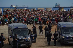 Spanish protesters and migrants clash with police in Ceuta one month after surge