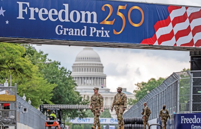 National Guard troops cross the Washington, D.C., race track, Aug. 18, 2026. (Julia Demaree Nikhinson/AP)
