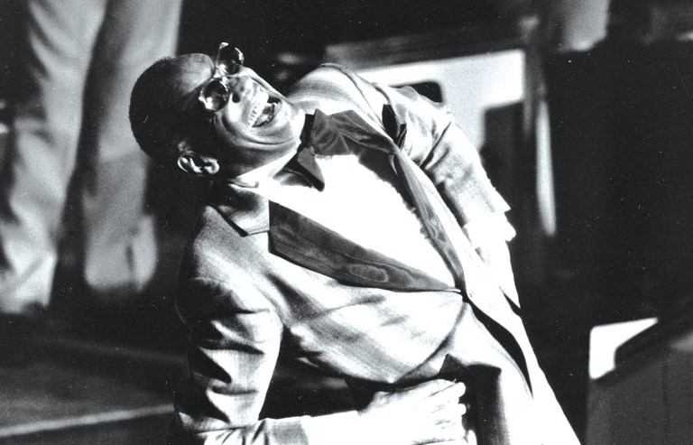 Ray Charles acknowledges the crowd after his performance at Avery Fisher Hall in New York on July 4, 1983, during the Kool Jazz Festival. (Rene Perez/ap)