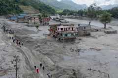Death toll rises in Nepal-China border disaster as lake poses new flood threat