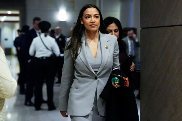 Rep. Alexandria Ocasio-Cortez (D-NY) departs a briefing on military strikes near Venezuela, Tuesday, Dec. 16, 2025, at the Capitol in Washington.