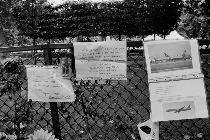Flowers and notes are left at a shrine dedicated to the victims of the 9/11 terrorist attacks near the World Trade Center site in New York City.