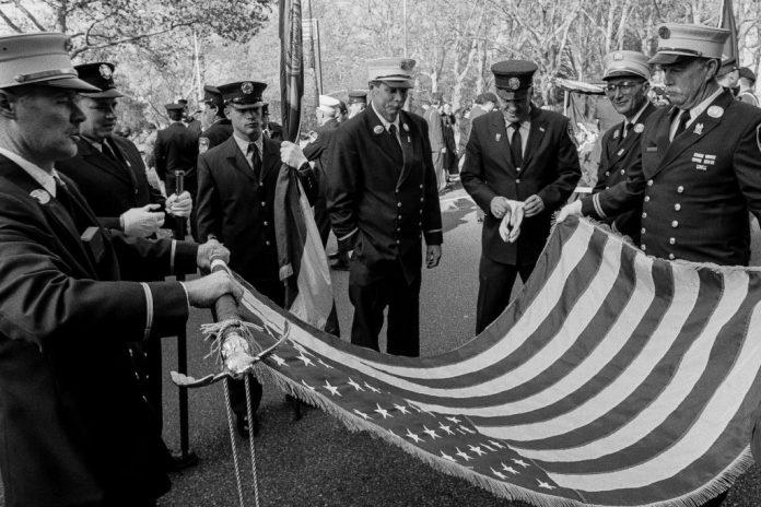 A funeral for a New York City firefighter who was killed during the 9/11 terrorist attacks.