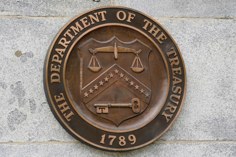 The Department of the Treasury's dark copper seal outside the Treasury Department building in Washington on May 4, 2021.