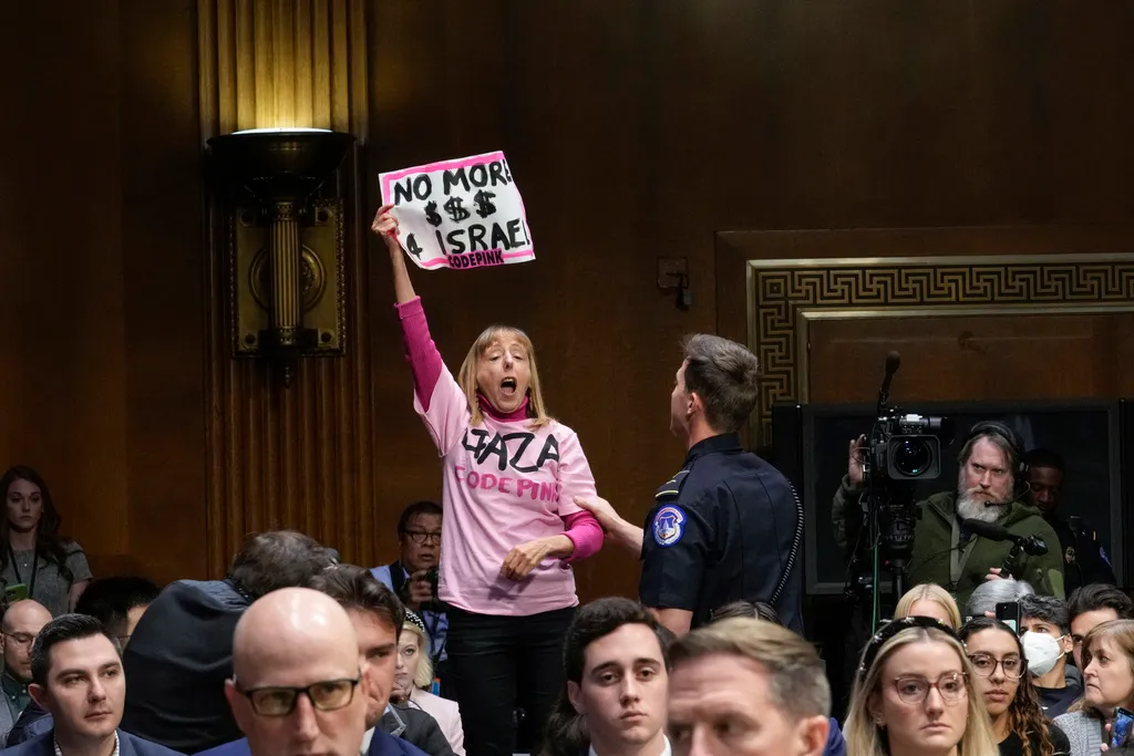 Anti-war activist Medea Benjamin shouts in protest