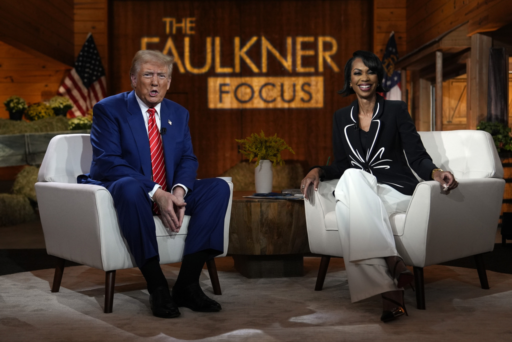 Republican presidential nominee former President Donald Trump pauses during a break in a Fox News town hall with Harris Faulkner at The Reid Barn, Tuesday, Oct. 15, 2024, in Cumming, Ga. (AP Photo/Julia Demaree Nikhinson)