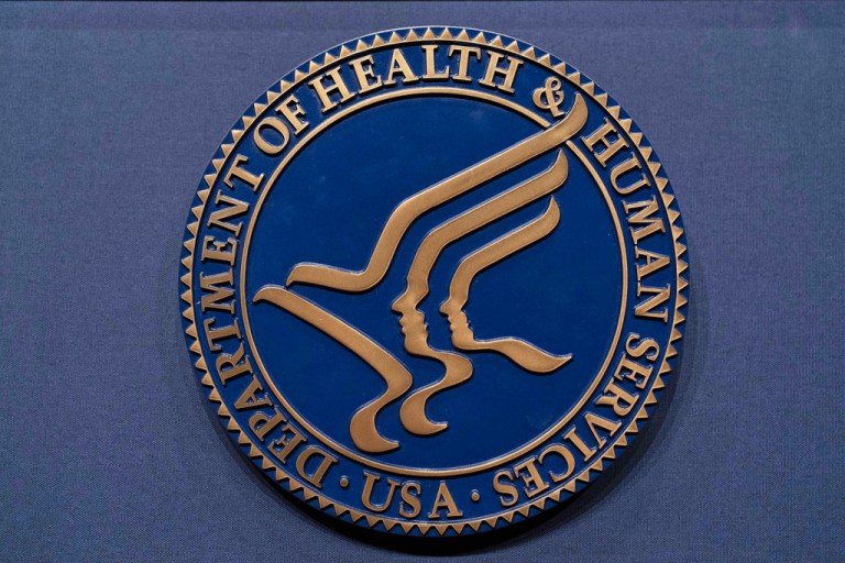 The Health and Human Services seal is seen before the news conference of Secretary Robert F. Kennedy Jr. at the Hubert Humphrey Building Auditorium.
