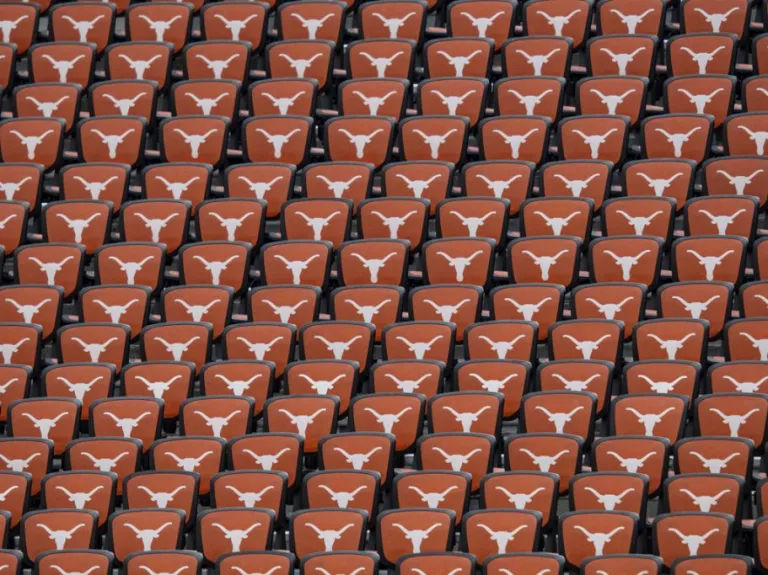 University of Texas Longhorn logos on the seats at the Darrel K. Royal Memorial Stadium.