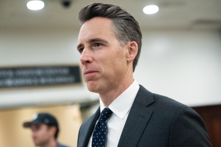 Side profile of Sen. Josh Hawley, R-Mo., as he walks through the Capitol during votes in Washington.