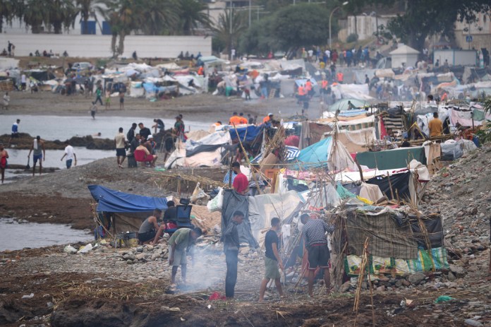 Migrants set up camp on Ceuta beach
