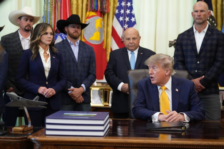 President Donald Trump speaks and announces action to help farmers and ranchers, as a group of farmers and ranchers stand behind, Friday, Sept. 4, 2026, in the Oval Office of the White House, in Washington. (AP Photo/Jacquelyn Martin)