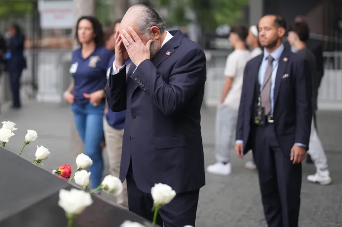 United States Secretary of Commerce Howard Lutnick stands at the memorial on the 25th anniversary of the September 11, 2001, terrorist attacks, Friday, Sept. 11, 2026, in New York. (AP Photo/Adam Gray, Pool)
