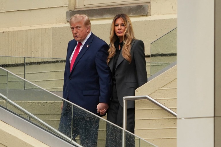President Donald Trump, left, and first lady Melania Trump arrive at an observance ceremony on the 25th anniversary of the 9/11 attacks.