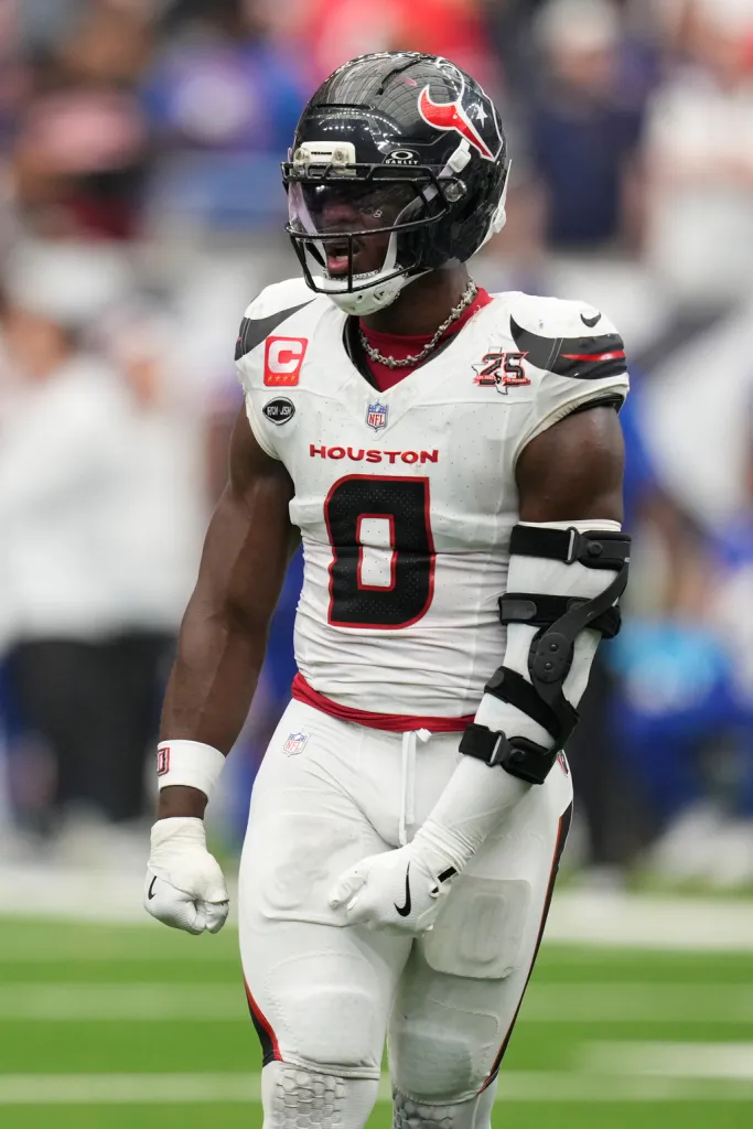 Houston Texans linebacker Azeez al-Shaair reacts after a stop during an NFL football game against the Buffalo Bills Sunday, Sept. 13, 2026, in Houston. The last three letters of "Hind Rajab" can be seen on his eye black. (AP Photo/Ashley Landis)