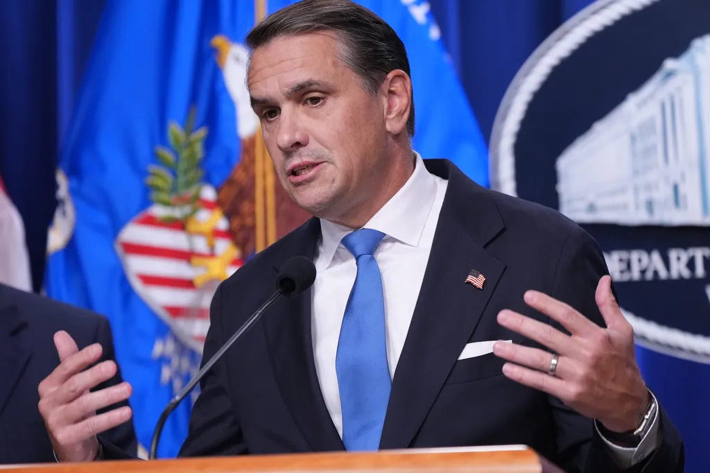 Attorney General Todd Blanche speaks during a news conference.