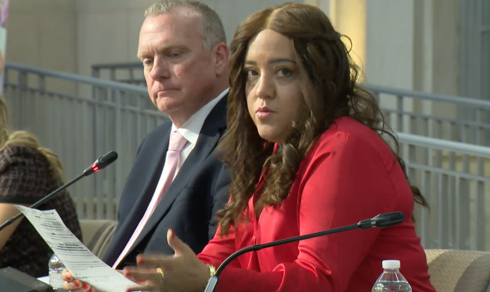 Washington Examiner homeland security reporter Anna Giaritelli speaks during a DOJ summit