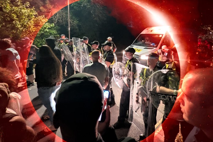 Police officers form a line to block protesters near Eastney Beach, in Portsmouth, England, Sunday, Sept. 6, 2026. (Examiner illustration; PA via AP; Getty Images)