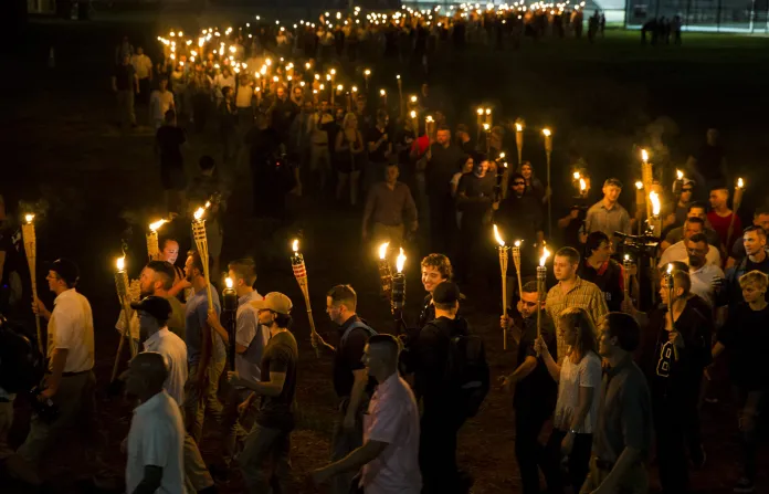 White Supremacists march through the University of Virginia campus in Charlottesville, Virginia on Aug. 11, 2017. (Jacquelyn Martin/AP Photo)