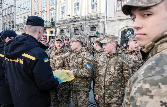 Police and military cadets mark the National Anthem Day of Ukraine in front of Lviv City Hall on March 10, 2026, in Lviv, Ukraine. (Les Kasyanov/Global Images Ukraine/Getty Images)