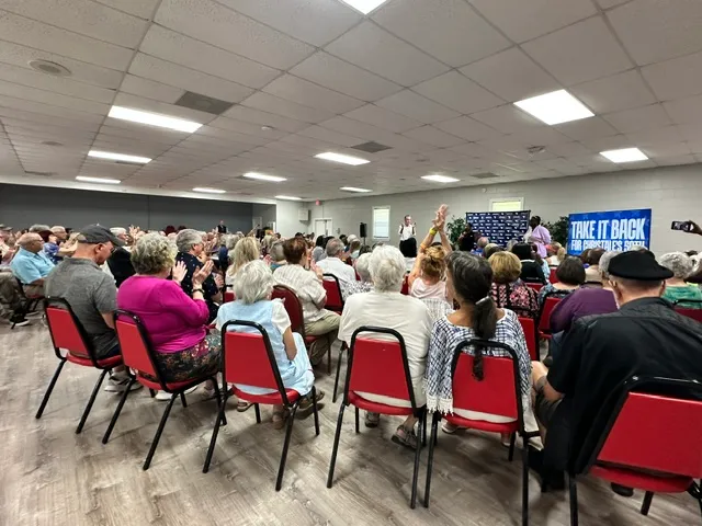 Democratic voters in South Carolina listen to Gov. Gavin Newsom (D-CA) talk.