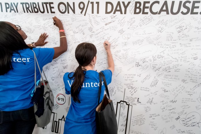 children writing on a wall
