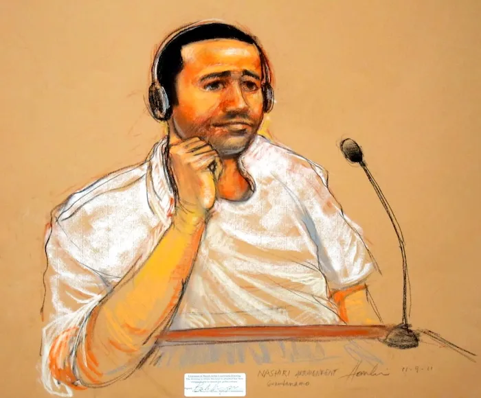 This artist rendering by courtroom artist Janet Hamlin, reviewed by the U.S. military, shows Abd Al Rahim Hussayn Muhammad Al Nashiri
